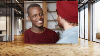 people, interracial friendship and communication concept. handsome cheerful young afro-american man  Wall mural