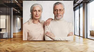 Photo of senior elderly couple demonstrate their true love to each other, have good relationships, experienced many positive and negative events in life together, being inseparable and supportive Wall mural