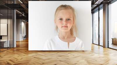 portrait of angel-like child in white morning light in studio. little european girl with blond hair  Wall mural