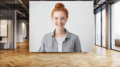 Portrait of positive cheerful teenage girl feeling happy, smiling broadly at camera after boy she likes returned her love and asked her out on date. Human facial expressions, emotions and feelings Wall mural