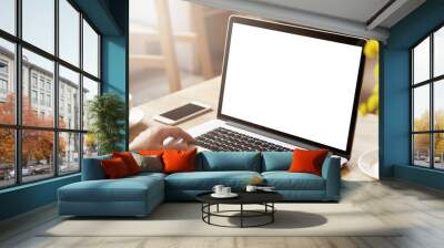 Selective focus. Cropped portrait of female employee typing on keyboard on generic laptop, working on financial report in office. Businesswoman checking e-mail sitting at table with generic phone Wall mural