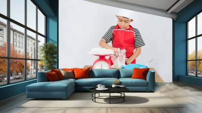 Little boy cooking cake home bakery Wall mural