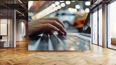 A persons hand using an interactive online buying experience portal Wall mural