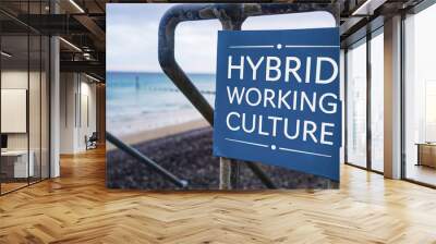 Hybrid Working Culture sign in a beach setting Wall mural