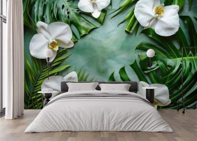 Aloha Background. Tropical Orchid Flowers and Palm Leaves on Green Beach Background Wall mural