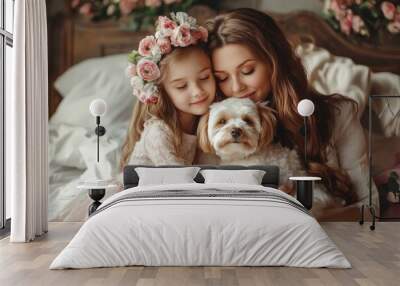 Pets In Clothes. Little Girl Holding Flowers Together with Mother and Two Cute Dogs in Domestic Room Wall mural