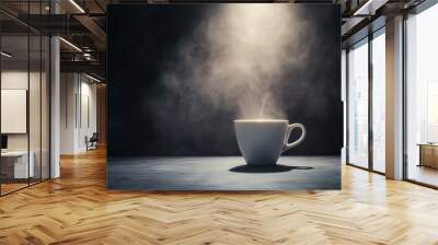 Steaming cup of coffee in dramatic lighting with dark background Wall mural