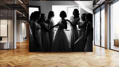 Wedding concept. Black and white photo, bride and bridesmaids posing in hotel or fitting room at wedding day. Wall mural