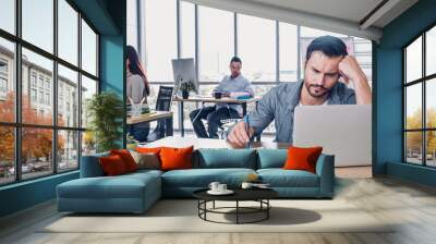 creative designer get stress while working with laptop at modern office.workplace lifesyle concept. Wall mural