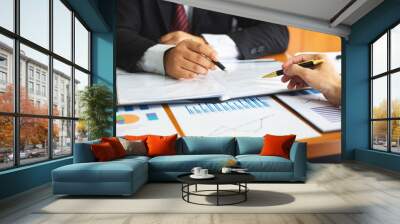 businessman working with documents in office Wall mural