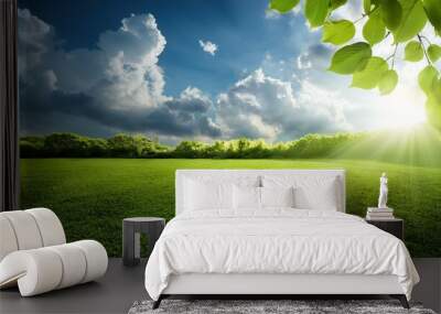 Green foliage background cloudy sky Wall mural