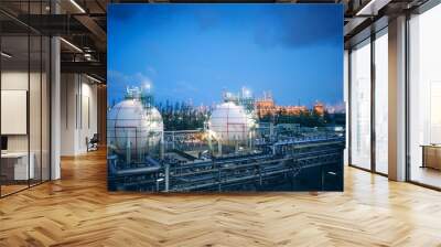 Gas storage sphere tanks and pipeline in Chemical industrial plant or Oil and gas refinery industrial on twilight sky background Wall mural