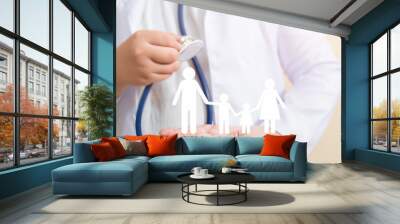 Doctor care of family , medical health insurance concept Wall mural