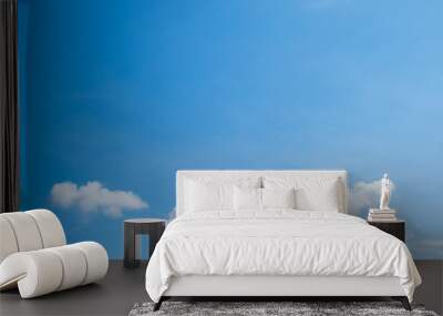 Beautiful clearly deep blue sky with white a little puffy clouds in a sunny day, copy space Wall mural