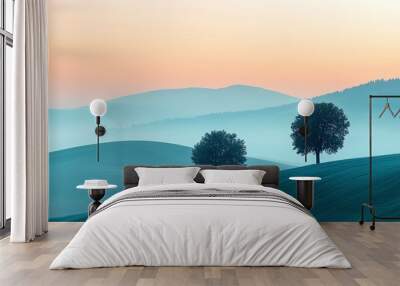 Serene landscape with gentle hills and two trees silhouetted against a pastel sky at dawn, evoking calm and tranquility. Wall mural