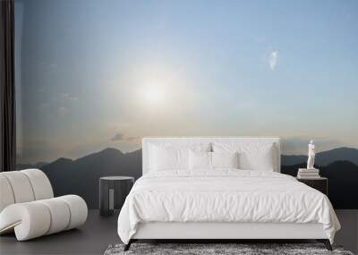 Panorama of sun flare with blue sky and mountains Wall mural