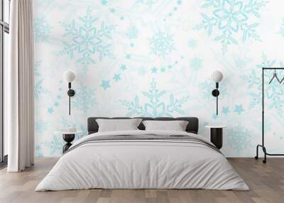 Light blue snowflakes, winter pattern that will tile seamlessly Wall mural