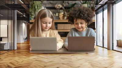 Two attentive primary school children of various ethnicities sit together at a table Wall mural