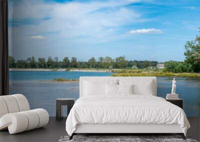 Panoramic view over the sand beaches and blue water of the lake in Weert, The Netherlands Wall mural