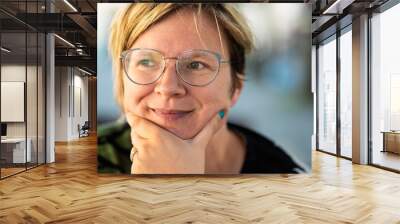 Portrait of a 37 yo smiling white woman, Belgium Wall mural