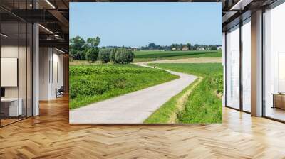 The meandering West Tour cycling trail through the agriculture fields around Hooglede, West Flanders , Belgium Wall mural