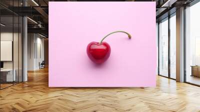 closeup of one cherry on pink background Wall mural