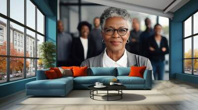 portrait of a black businesswoman with blurry group in the background, ai generated Wall mural