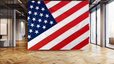 Close up of ruffled American flag. Satin texture curved flag of USA. Memorial Day or 4th of July. Banner, freedom concept Wall mural