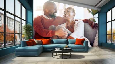 Relax, happy and love with black couple on sofa for retirement, support and smile together. Marriage, lifestyle and laughing with old man and woman in living room at home for joke, funny and bonding Wall mural