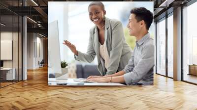 Mentor, manager and teamwork with a business woman training a male employee in the office. Meeting, management and support with an African female leader teaching or coaching an asian man at work Wall mural