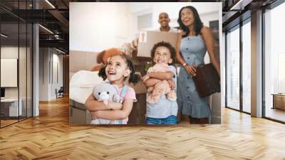 Moving, happy and real estate with family in new house for investment, property and future. Smile, boxes and purchase with children and parents for mortgage, excited and homeowner relocation Wall mural