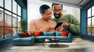 Phone, happy and black couple on sofa online for social media, internet and browse website. Love, dating and man and woman on smartphone for bonding, relationship and relax together in living room Wall mural