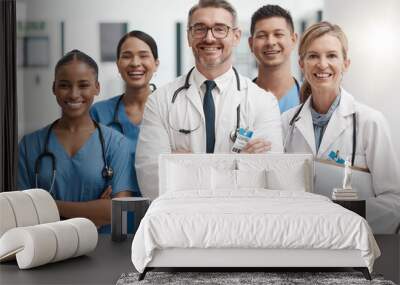 Team of doctor and nurse with vision, teamwork and arms crossed while working at a hospital. Happy medical expert, healthcare and professional group smile at work together for success at a clinic Wall mural