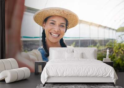 Selfie, happy and farmer woman in a greenhouse for agriculture or sustainability in the harvest season. Portrait, smile in nature and a young female farming in a natural garden for ecology and growth Wall mural