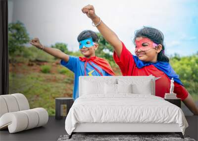 excited happy teenager kids in super hero costume on empty road with flying gesture - concept of fantasy, teamwork and courage. Wall mural