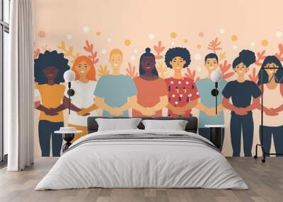 A group of people are standing together, smiling and holding hands Wall mural