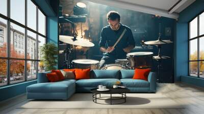 A man is playing drums in a studio Wall mural