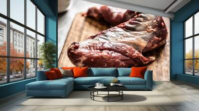 A big piece of raw beef sirloin on wooden desk Wall mural