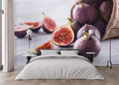 A few figs freely lying on old wooden table Wall mural