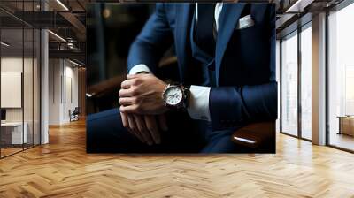 businessman with watch sitting down Wall mural