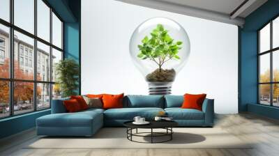 Green plant inside light bulb on white background. Environment conservation concept. Wall mural