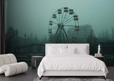 Abandoned Ferris Wheel in Foggy Atmosphere Wall mural