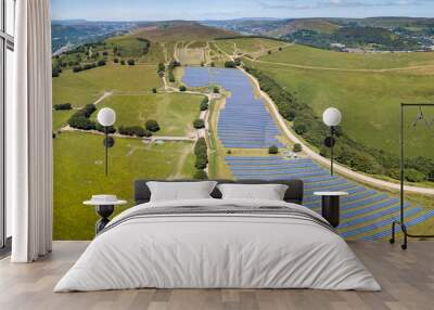 Aerial drone view of a solar energy farm on a mountainside (South Wales) Wall mural