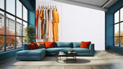 fashion clothes on a stand in a light background indoors. place for text
 Wall mural