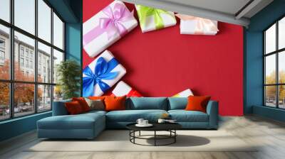 gifts on a colored background top view. Holiday, giving presents, birthday. Wall mural