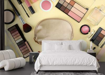 professional makeup tools. Makeup products on plain background top view. A set of various items for makeup. Wall mural