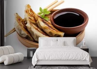 Fried dumplings gyoza with soy sauce, and chopsticks, selective focus isolated on white background Wall mural