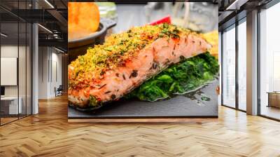 Grilled salmon on cutting board on wooden background Wall mural