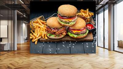 Set of different burgers with french fries . Burger with chicken, beef and smoked pork Wall mural