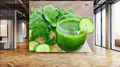 Green vegetable juice and fresh vegetables Wall mural